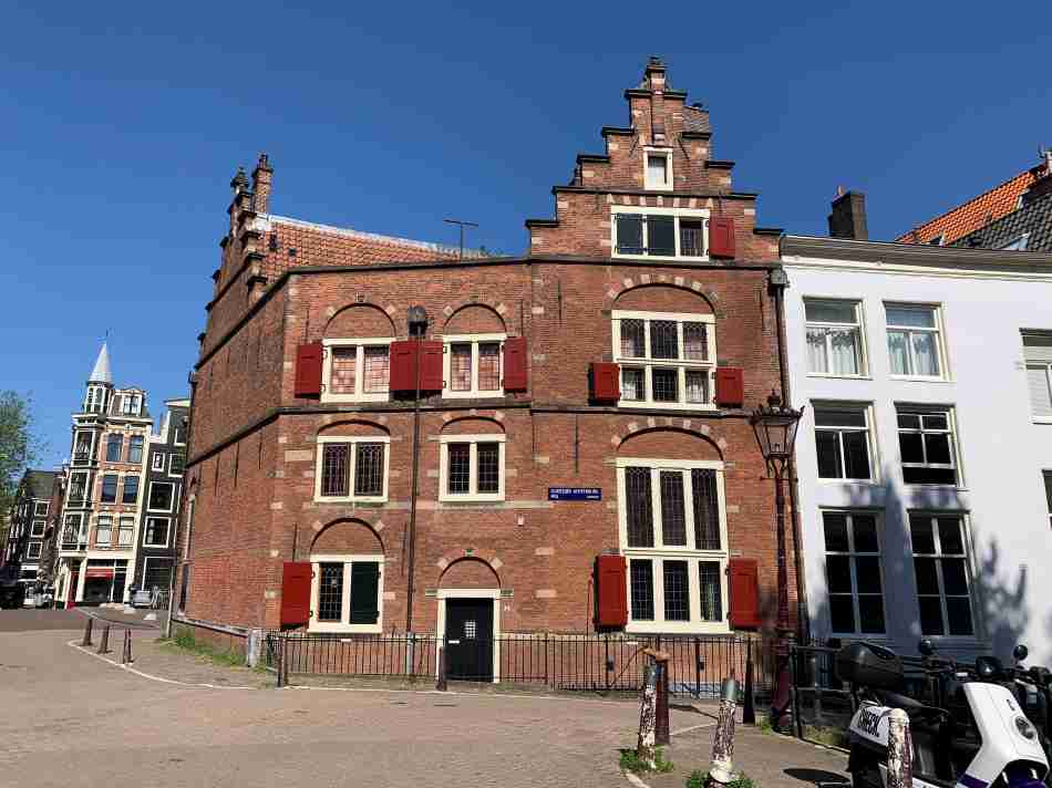 A House in Amsterdam surrounded by three different canals