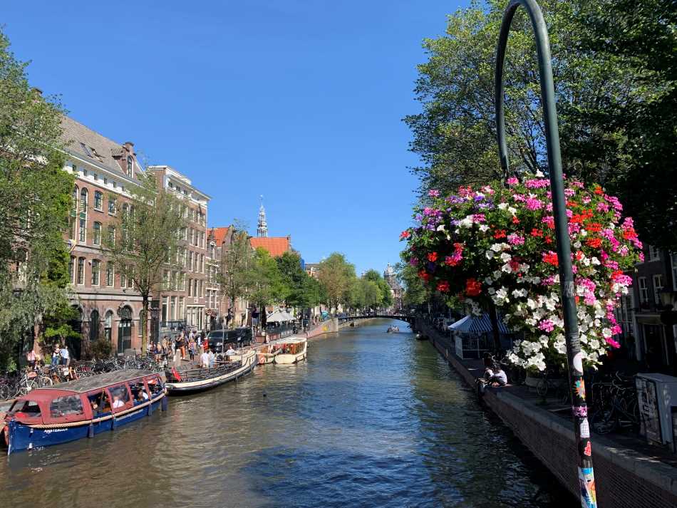 Plenty of flowers on the canal bridges in Amsterdam
